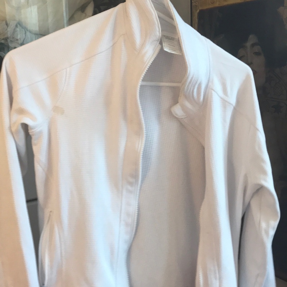 Small white zip up athletic jacket